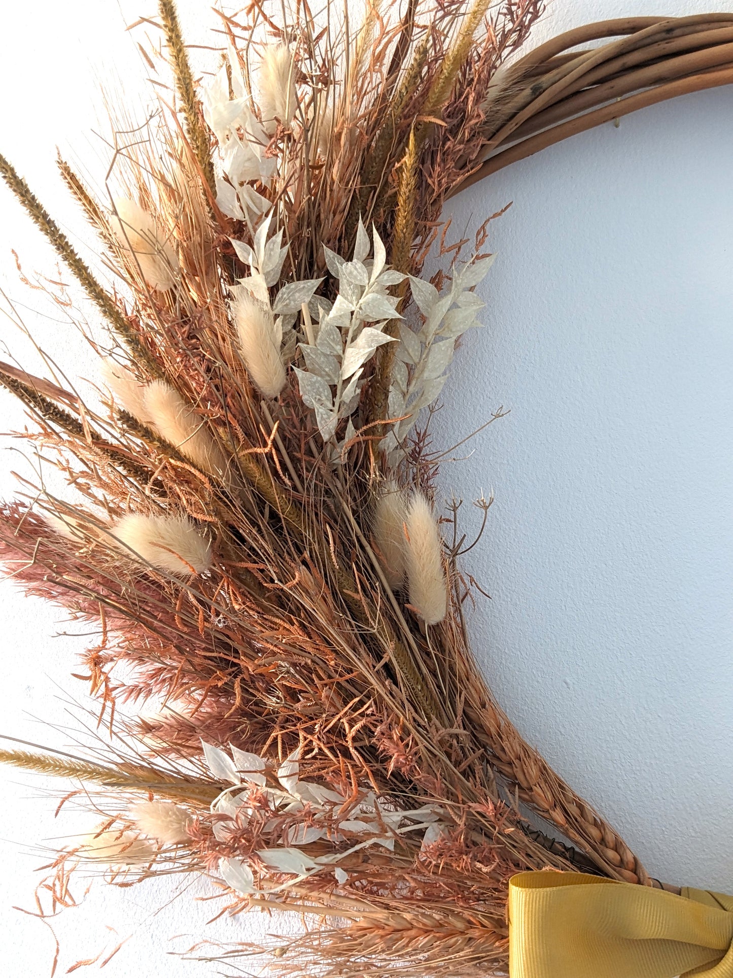 cream pink and mustard dried flower wreath